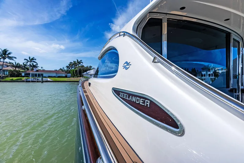 A. Noochette Yacht Photos Pics 2024 Zeelander Z5 yacht on serene water, showcasing sleek design and luxury.