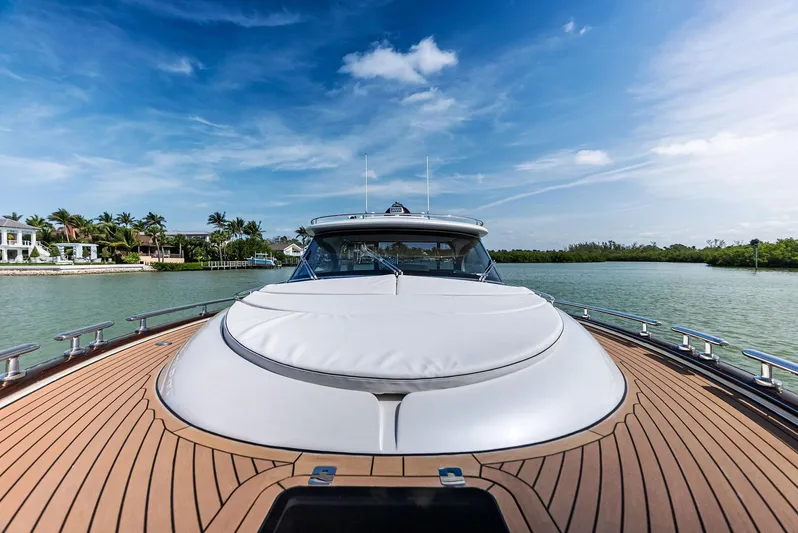 A. Noochette Yacht Photos Pics 2024 Zeelander Z5 yacht on serene water, showcasing sleek design and luxury.