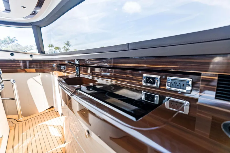 A. Noochette Yacht Photos Pics Luxurious interior of 2024 Zeelander Z5 yacht with sleek wood finish and modern amenities.