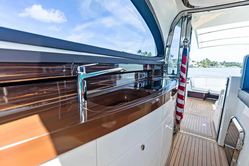 A. Noochette Yacht Photos Pics 2024 Zeelander Z5 yacht interior with sleek wood finish and modern design.