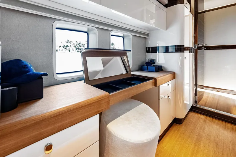 A. Noochette Yacht Photos Pics Luxurious interior of 2024 Zeelander Z5 yacht with elegant wood and white finishes.