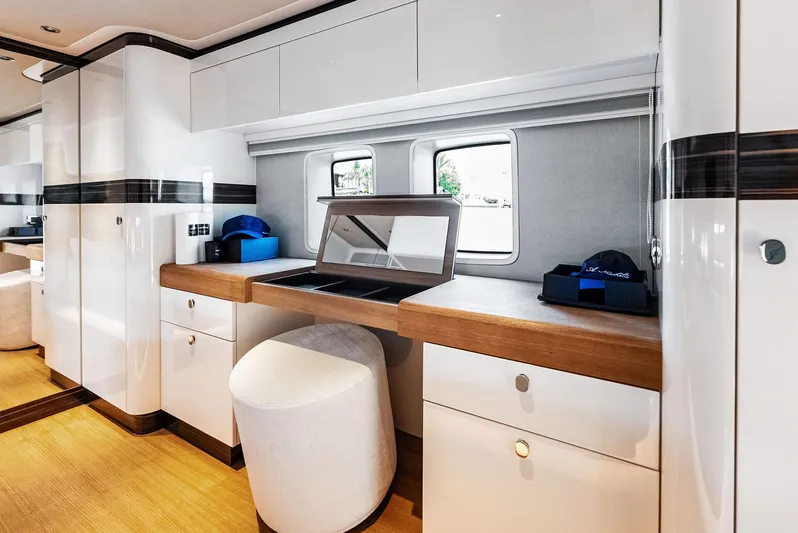 A. Noochette Yacht Photos Pics Luxurious interior of 2024 Zeelander Z5 yacht with elegant wood and white finishes.