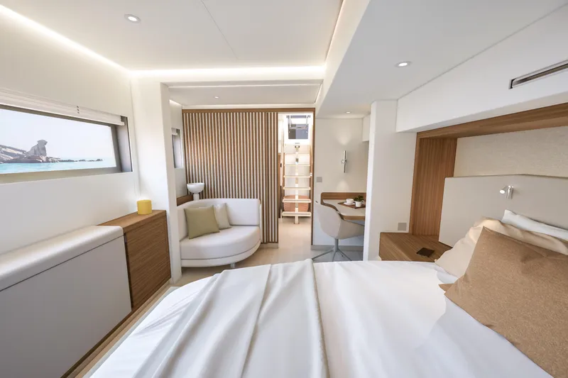 Hull #2 Fpy 70 - Coming End 2026 Yacht Photos Pics Luxurious interior of 2027 Fountaine Pajot FPY 70 yacht with modern design and cozy furnishings.