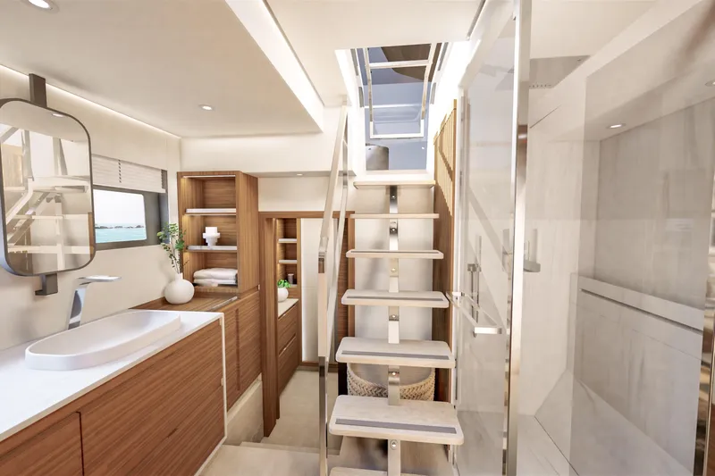 Hull #2 Fpy 70 - Coming End 2026 Yacht Photos Pics Luxurious interior of 2027 Fountaine Pajot FPY 70 yacht with modern bathroom and staircase.