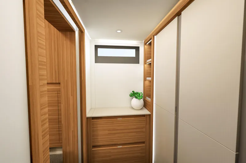 Hull #2 Fpy 70 - Coming End 2026 Yacht Photos Pics Luxurious interior of 2027 Fountaine Pajot FPY 70 yacht with modern wood cabinetry.