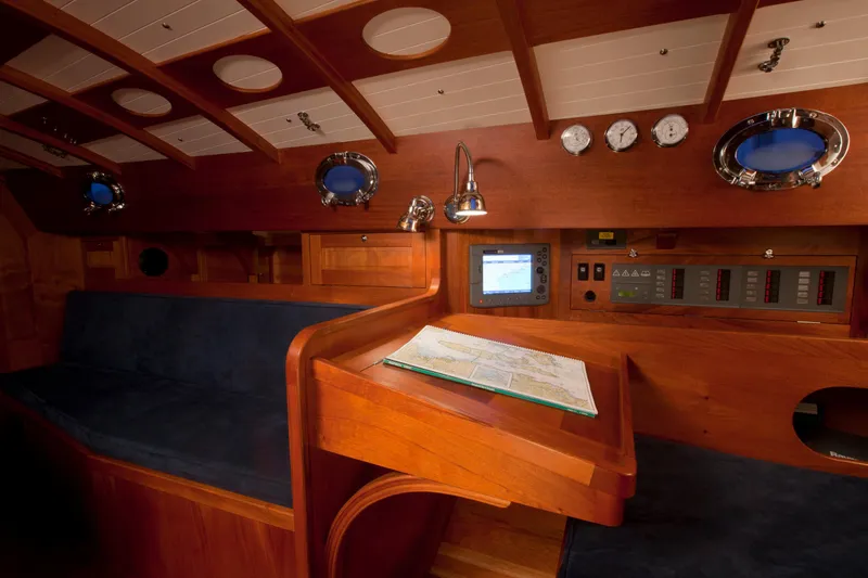 Bamboozle Yacht Photos Pics Interior of 2010 Spirit Yachts Spirit 46, featuring navigation station and wooden finish.