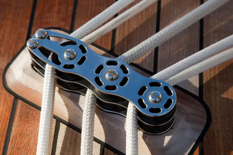 Bamboozle Yacht Photos Pics Close-up of Spirit Yachts Spirit 46 deck rigging, featuring polished metal pulleys and ropes, 2010 model.