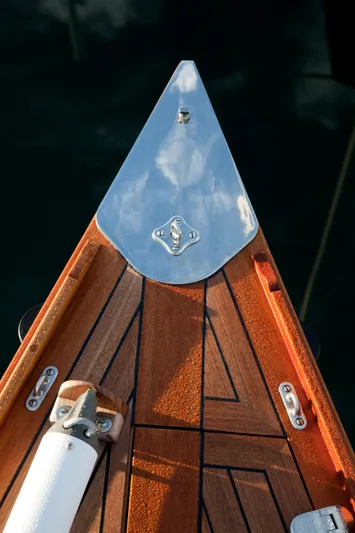 Bamboozle Yacht Photos Pics Bow of 2010 Spirit Yachts Spirit 46 with polished wood and metal detailing.