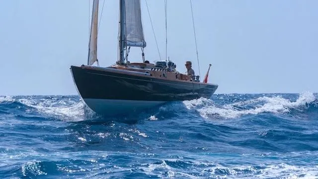 Bamboozle Yacht Photos Pics Sailing yacht Spirit 46 from 2010 navigating through ocean waves.