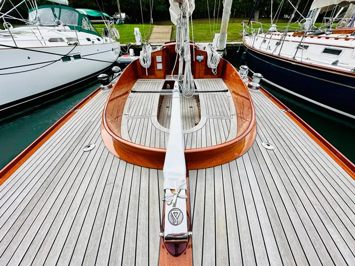 Bamboozle Yacht Photos Pics Spirit Yachts Spirit 46, 2010 model, elegant wooden deck, docked between sailboats.