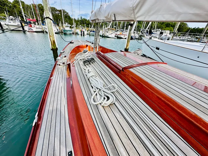 Bamboozle Yacht Photos Pics Spirit Yachts Spirit 46, 2010 model, docked with wooden deck and coiled ropes.