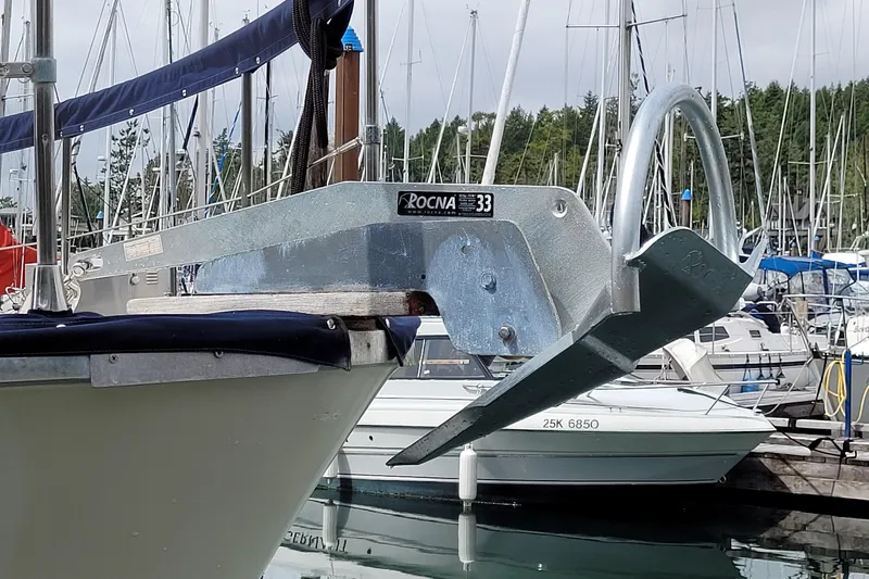 Rose Petal Yacht Photos Pics 1981 Tollycraft 48 Cockpit Motor Yacht with Rocna 33 anchor at marina.