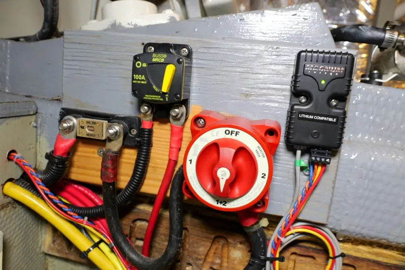 Rose Petal Yacht Photos Pics Electrical panel of 1981 Tollycraft 48 Cockpit Motor Yacht with switches and wiring.