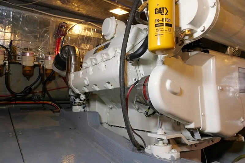 Rose Petal Yacht Photos Pics Engine room of 1981 Tollycraft 48 Cockpit Motor Yacht with CAT fuel filter.