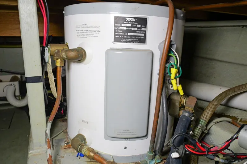 Rose Petal Yacht Photos Pics 1981 Tollycraft 48 Cockpit Motor Yacht water heater in engine room.