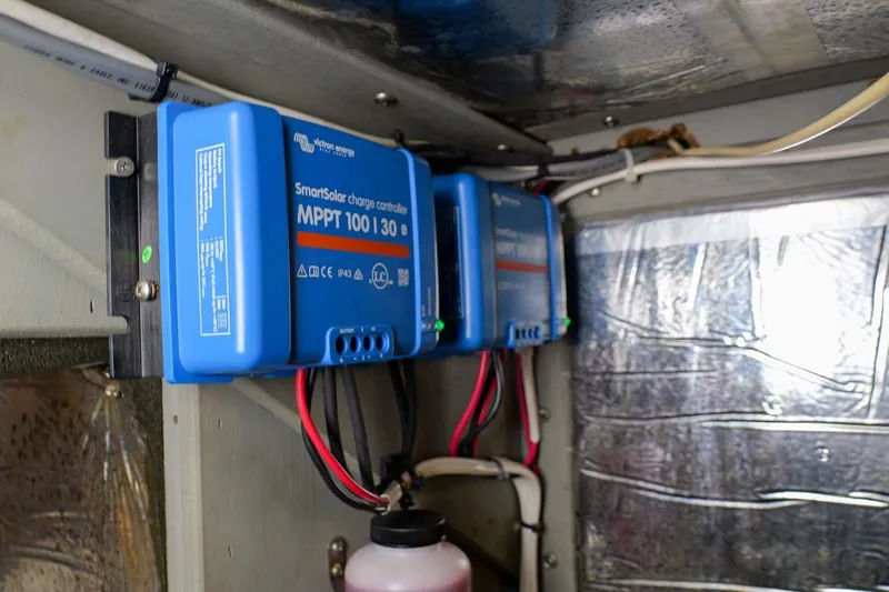 Rose Petal Yacht Photos Pics SmartSolar charge controllers in 1981 Tollycraft 48 Cockpit Motor Yacht engine room.