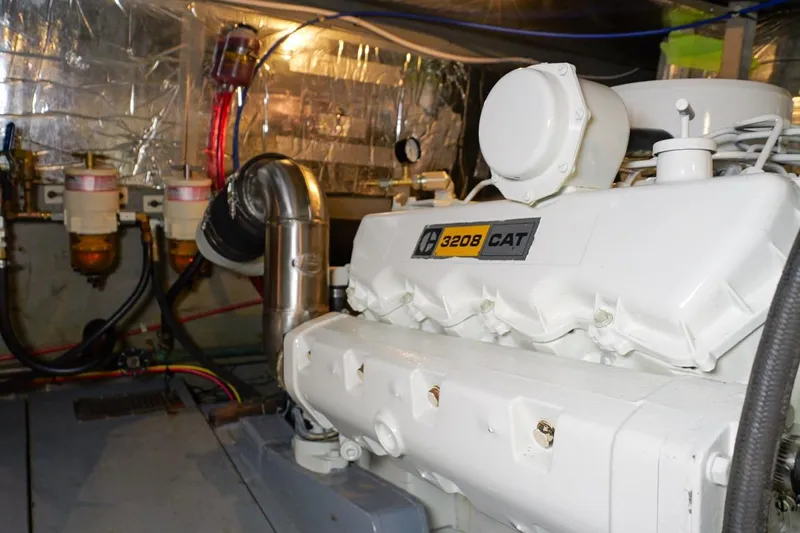 Rose Petal Yacht Photos Pics Engine room of 1981 Tollycraft 48 Cockpit Motor Yacht with CAT 3208 engine.