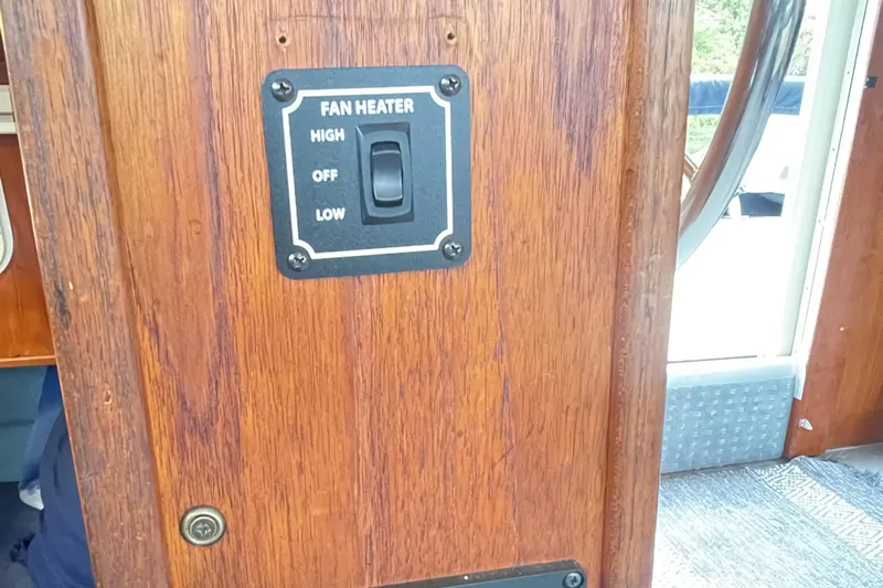 Rose Petal Yacht Photos Pics Wooden panel with fan heater switch on 1981 Tollycraft 48 Cockpit Motor Yacht.