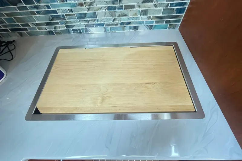 Rose Petal Yacht Photos Pics Cutting board on Tollycraft 48 Cockpit Motor Yacht, 1981, with tiled backsplash.