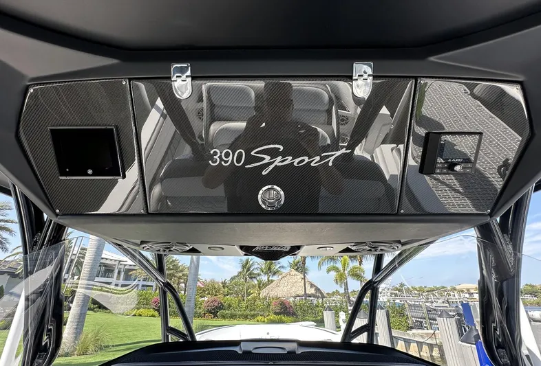  Yacht Photos Pics 2023 Nor-Tech 390 Sport Center Console dashboard with tropical marina view.