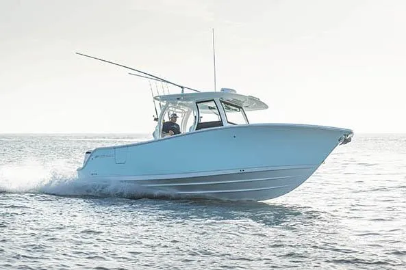  Yacht Photos Pics Manufacturer Provided Image: 2024 Sportsman Open 302 Center Console boat cruising on the water.