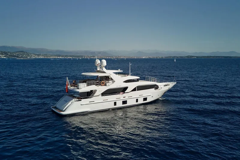 Sea Bear Yacht Photos Pics Luxurious 2013 Benetti 93 Delfino yacht cruising on open sea.
