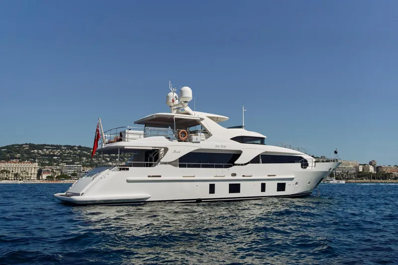 Sea Bear Yacht Photos Pics Luxury 2013 Benetti 93 Delfino yacht cruising on a sunny day.