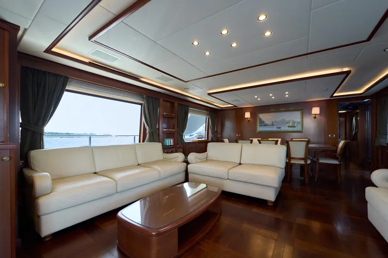 Sea Bear Yacht Photos Pics Luxurious interior of 2013 Benetti 93 Delfino yacht with elegant seating and wood finishes.