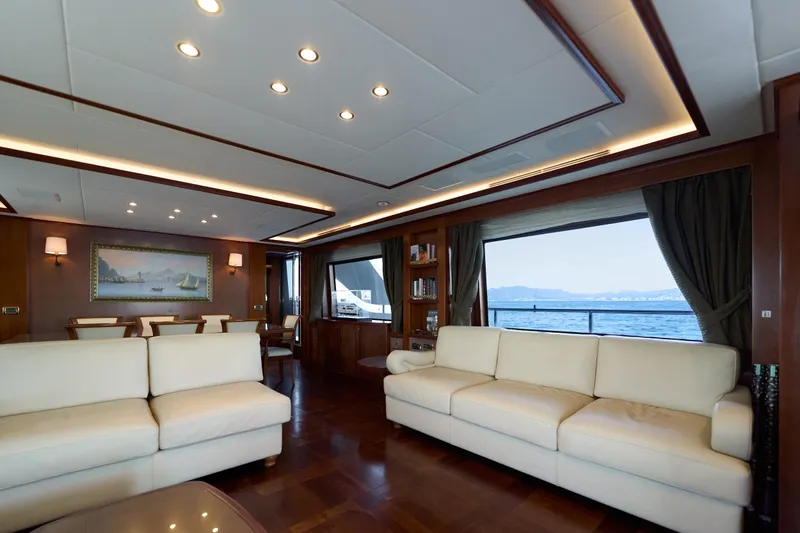 Sea Bear Yacht Photos Pics Luxurious interior of 2013 Benetti 93 Delfino yacht with elegant seating and ocean view.
