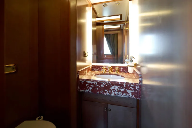 Sea Bear Yacht Photos Pics Luxurious bathroom with marble sink on 2013 Benetti 93 Delfino yacht.