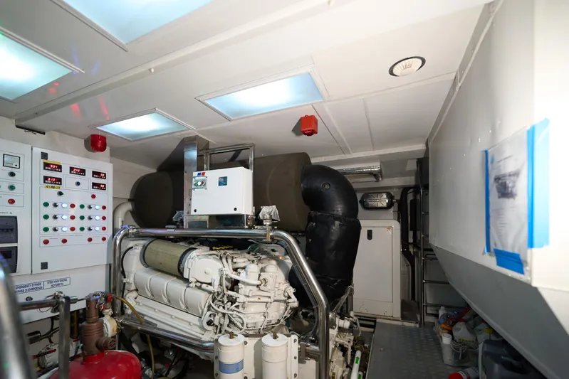 Sea Bear Yacht Photos Pics Engine room of 2013 Benetti 93 Delfino yacht, featuring control panels and machinery.
