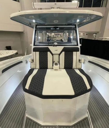  Yacht Photos Pics 2025 Tidewater 380 CC Adventure boat with sleek seating and modern design.