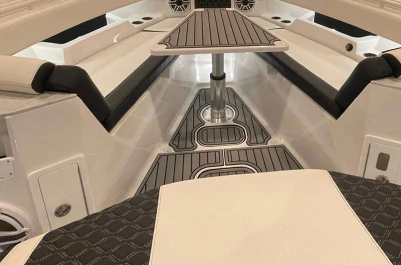  Yacht Photos Pics 2025 Tidewater 380 CC Adventure boat interior with sleek seating and modern design.