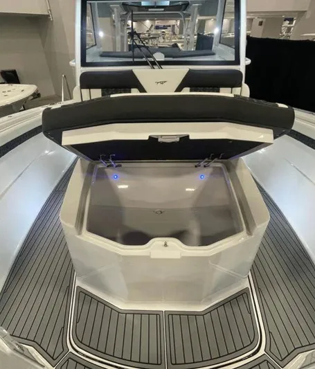  Yacht Photos Pics 2025 Tidewater 380 CC Adventure boat interior with open storage compartment.