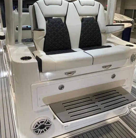  Yacht Photos Pics 2025 Tidewater 380 CC Adventure boat seating with sleek design and integrated storage.