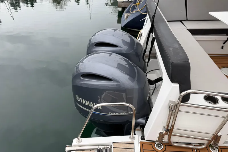  Yacht Photos Pics Twin Yamaha outboard engines on a 2020 Jeanneau NC 895 boat at dock.