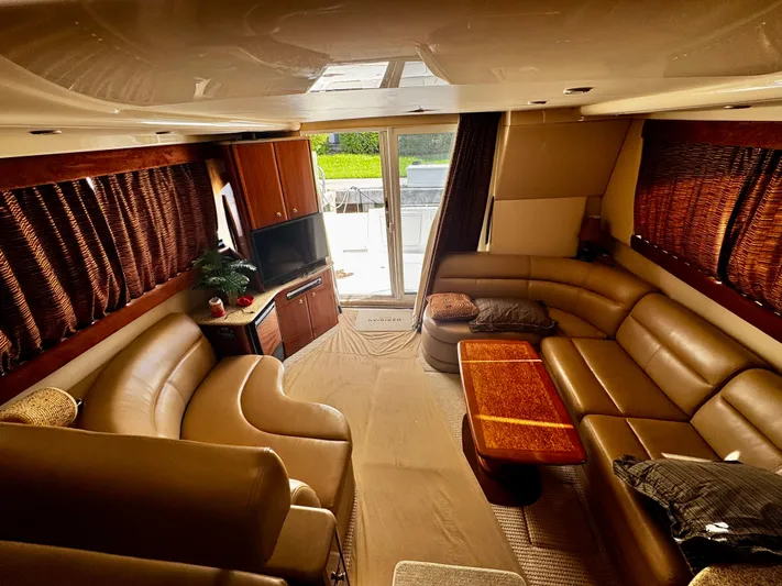  Yacht Photos Pics Luxurious interior of a 2007 Meridian 411 Sedan yacht with leather seating and elegant decor.