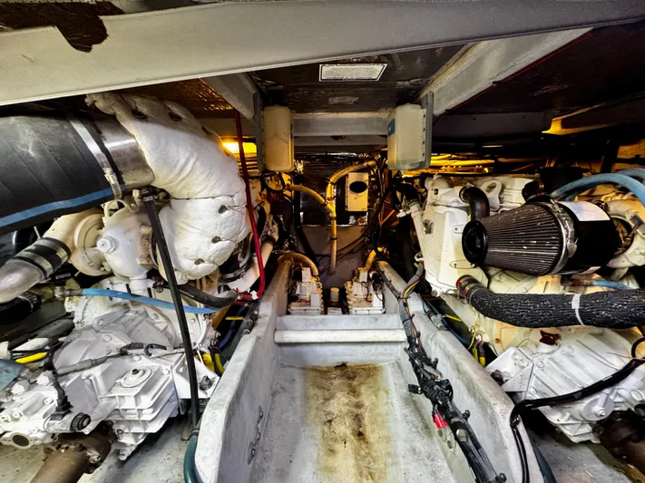  Yacht Photos Pics Engine room of a 2007 Meridian 411 Sedan, showcasing mechanical components and systems.