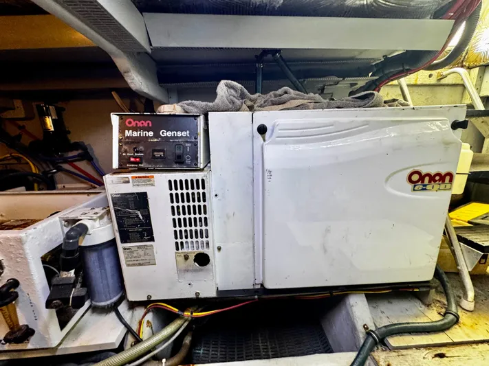  Yacht Photos Pics Onan marine generator in a 2007 Meridian 411 Sedan engine room.