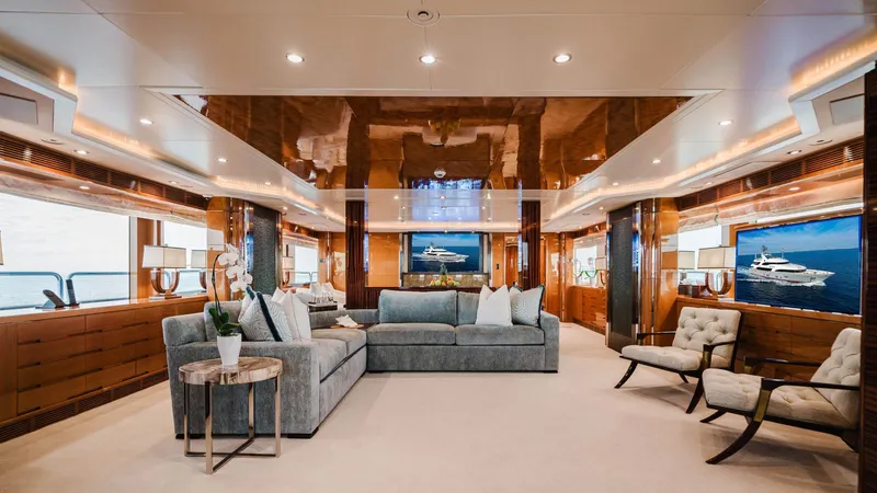 Groover Yacht Photos Pics Luxurious interior of 2009 Benetti 145 yacht with elegant seating and modern decor.