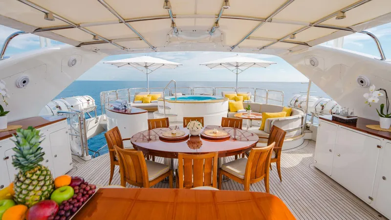 Groover Yacht Photos Pics Luxurious deck of 2009 Benetti 145 yacht with dining area and jacuzzi.