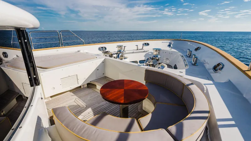Groover Yacht Photos Pics Luxurious 2009 Benetti 145 yacht deck with circular seating and ocean view.