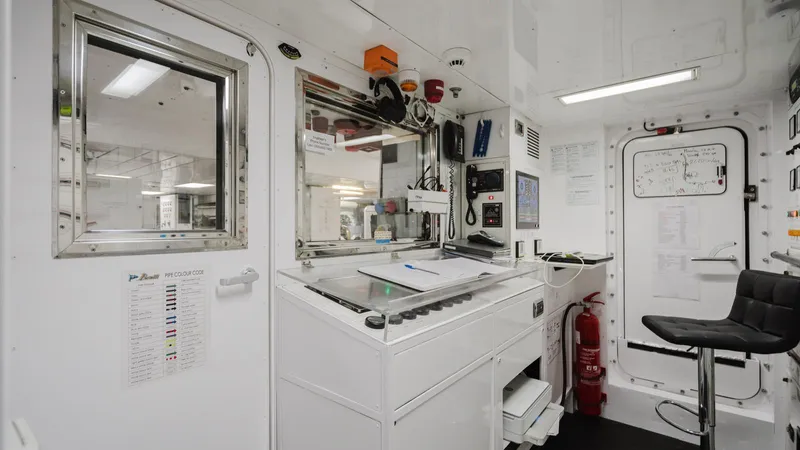 Groover Yacht Photos Pics Control room of a 2009 Benetti 145 yacht, featuring navigation equipment and safety gear.