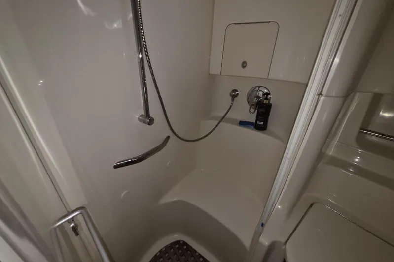 Yacht Photos Pics Shower area in 2004 Sea Ray 380 Sundancer yacht, featuring sleek design and modern fixtures.