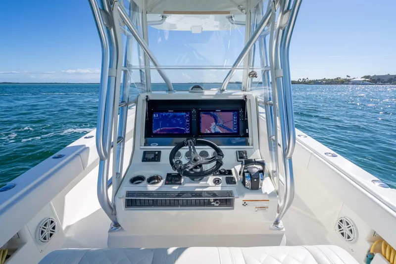  Yacht Photos Pics 2019 SeaVee 340Z boat cockpit with advanced navigation system on open water.