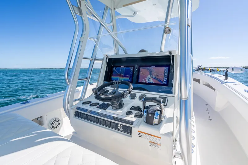  Yacht Photos Pics 2019 SeaVee 340Z boat console with dual navigation screens on open water.