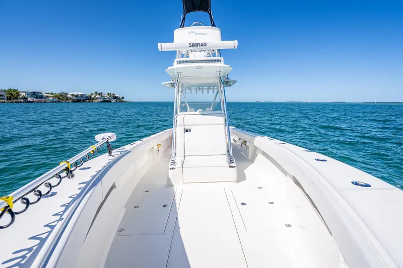  Yacht Photos Pics 2019 SeaVee 340Z boat on open water, clear blue sky, and coastal view.