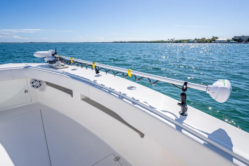  Yacht Photos Pics 2019 SeaVee 340Z boat on water, featuring a sleek deck and fishing rod holders.