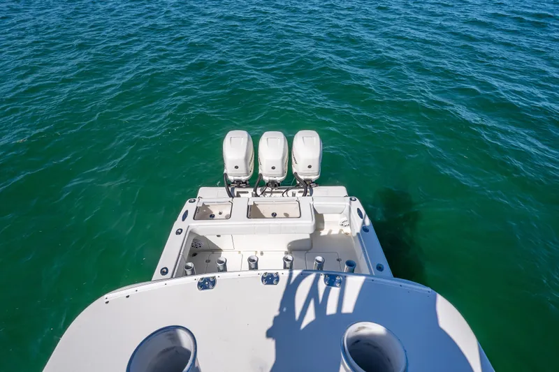  Yacht Photos Pics 2019 SeaVee 340Z boat with triple outboard engines on open water.