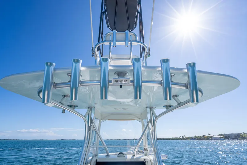  Yacht Photos Pics 2019 SeaVee 340Z boat with rod holders under sunny blue sky.
